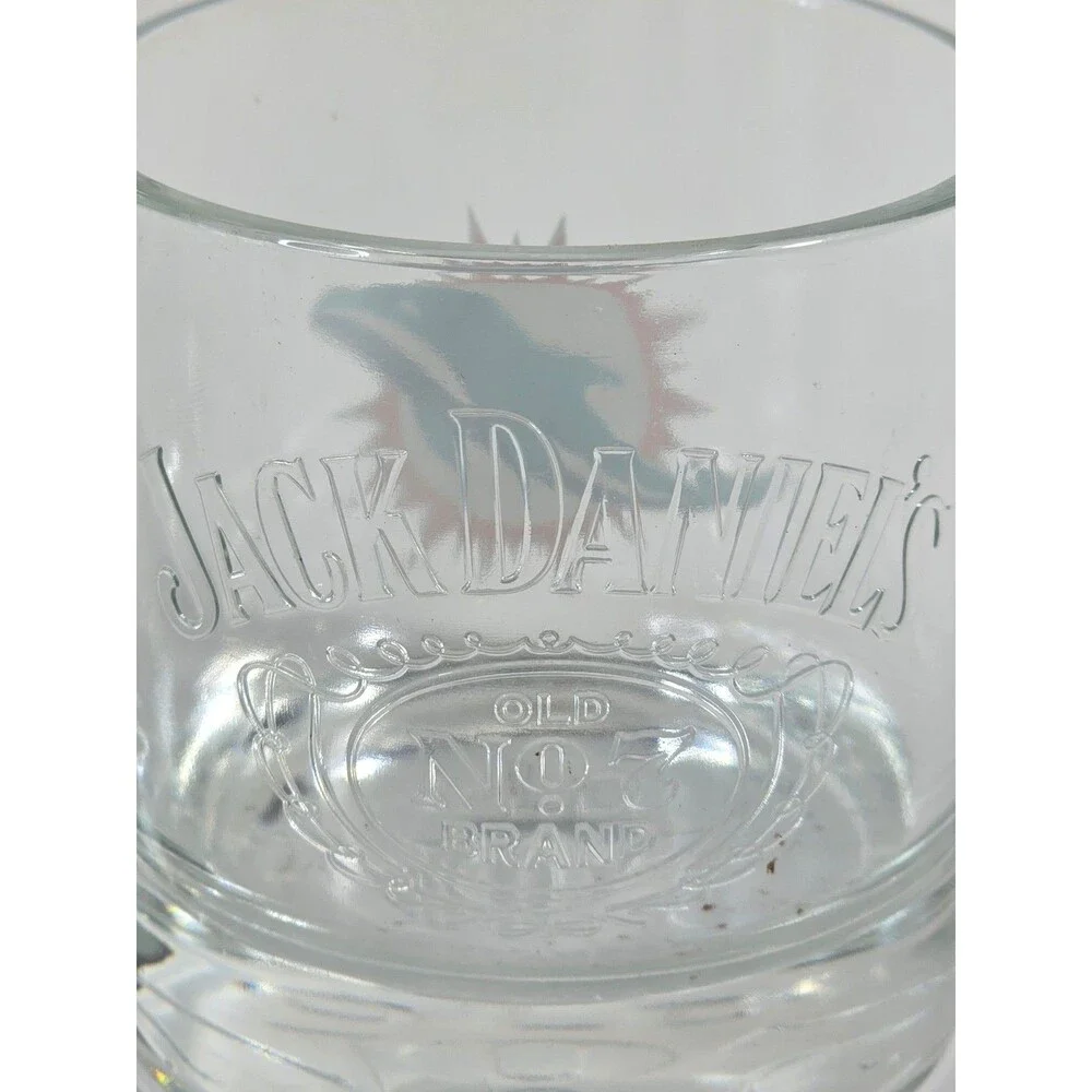 Jack Daniel's promotional NFL rocks glasses featuring the Miami Dolphins logo